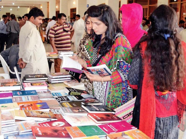 women check out books at a stall set up at the 1st hyderabad literature festival on saturday photo nni women check out books at a stall set up at the 1st hyderabad literature festival on saturday photo nni