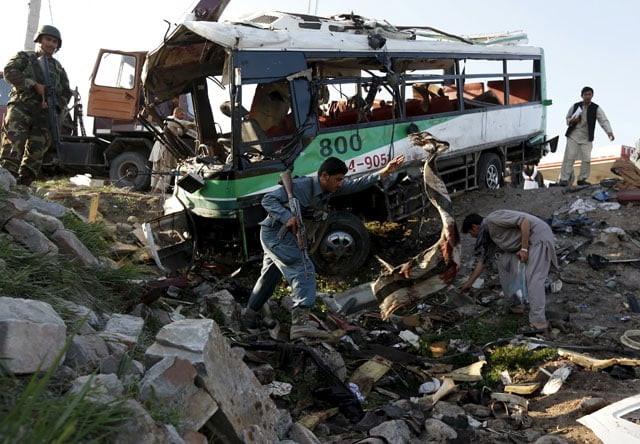afghan policemen inspect next to a damaged police vehicle after a suicide attack in jalalabad eastern afghanistan april 11 2016 photo reuters afghan policemen inspect next to a damaged police vehicle after a suicide attack in jalalabad eastern afghanistan april 11 2016 photo reuters