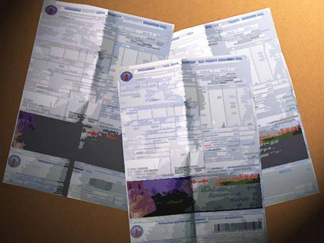 company staff pasting fake pictures of meter reading on consumer bills photo file