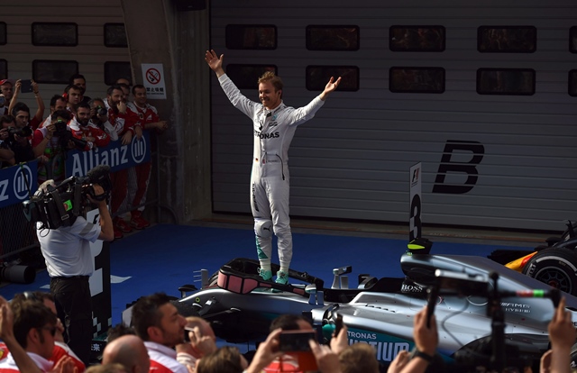 nico rosberg celebrates after winning the formula one chinese grand prix in shanghai on april 17 2016 photo afp