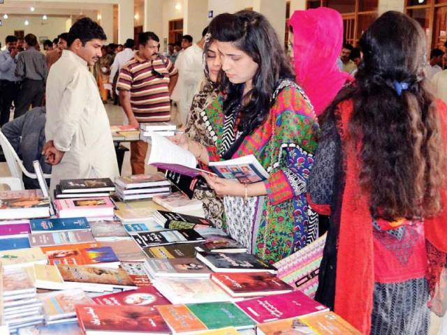 women check out books at a stall set up at the 1st hyderabad literature festival on saturday photo nni