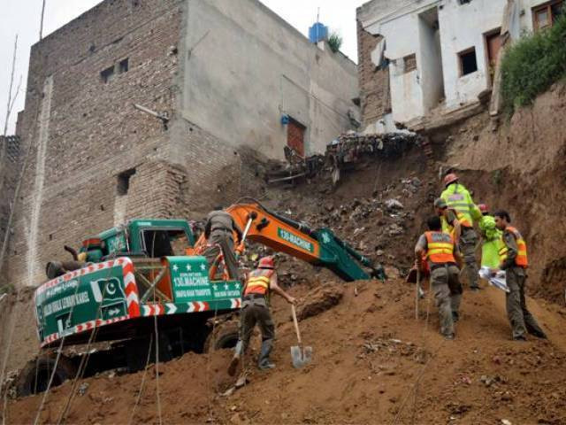 in this file photo rescue officials are seen busy in relief operation after a house collapsed in peshawar on march 24 2016 photo ppi in this file photo rescue officials are seen busy in relief operation after a house collapsed in peshawar on march 24 2016 photo ppi