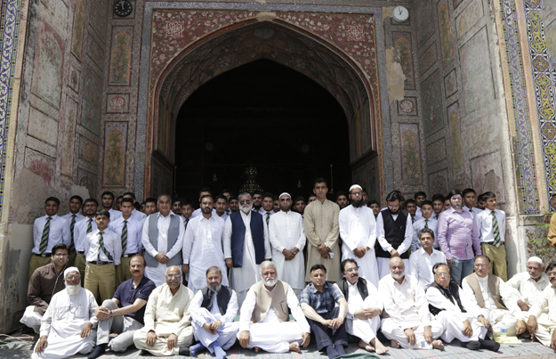 group photo of opening ceremony of akhuwat office photo nni