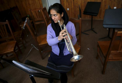 afghan teenager braves threats family pressure to lead women s orchestra