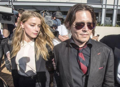 johnny depp s wife cops good behavior bond as australia ends war on terrier