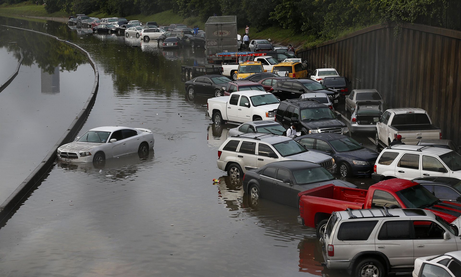 vehicles left stranded on a flooded interstate 45 in houston texas photo afp