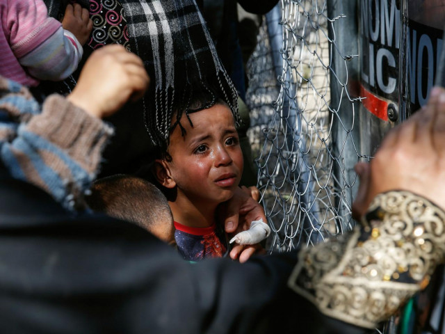 a child cries as migrants and refugees clash with greek policemen as they try to open the border fence at a makeshift camp at the greek macedonian border near the village of idomeni greece april 7 2016 photo reuters a child cries as migrants and refugees clash with greek policemen as they try to open the border fence at a makeshift camp at the greek macedonian border near the village of idomeni greece april 7 2016 photo reuters