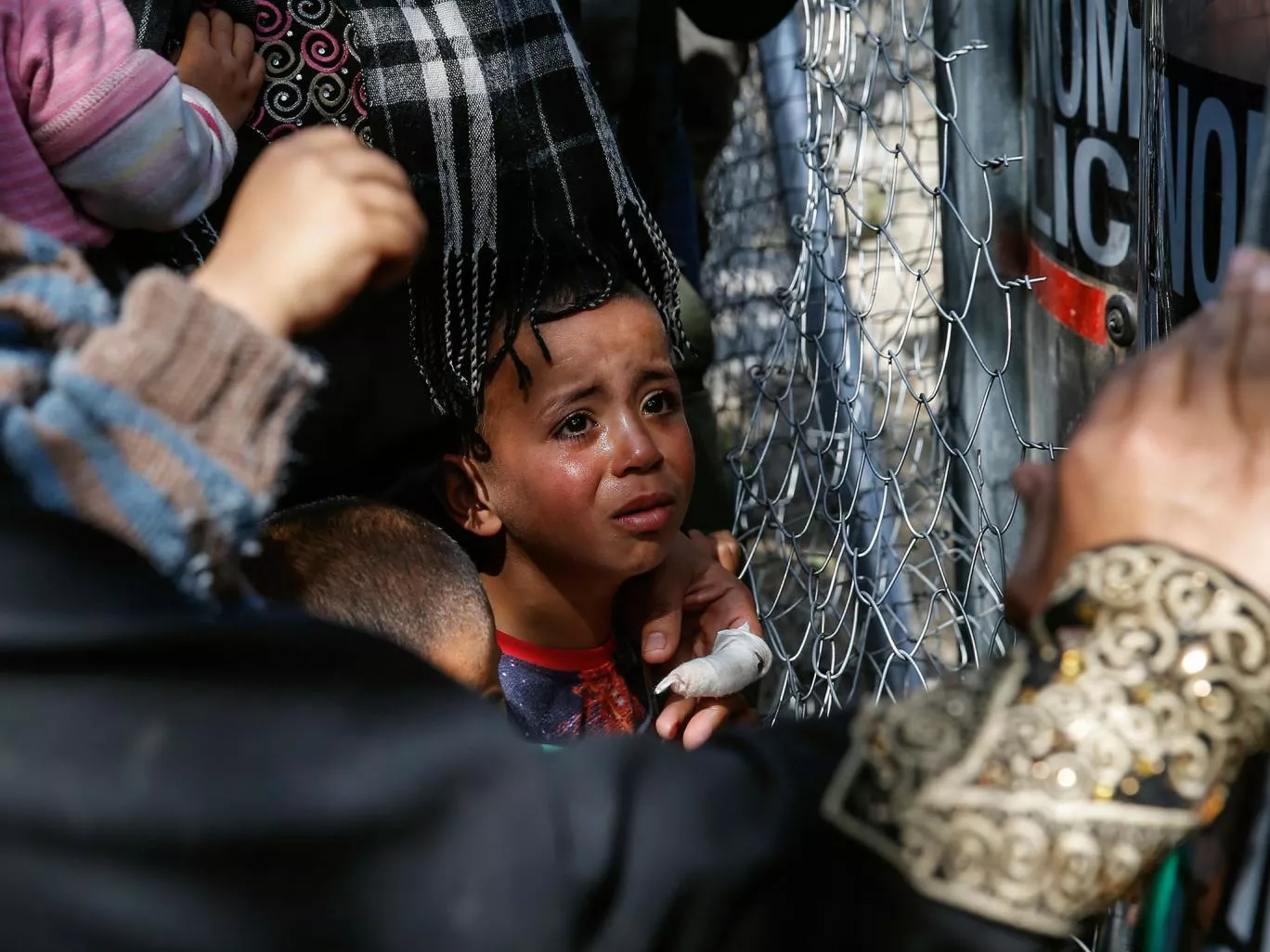 a child cries as migrants and refugees clash with greek policemen as they try to open the border fence at a makeshift camp at the greek macedonian border near the village of idomeni greece april 7 2016 photo reuters a child cries as migrants and refugees clash with greek policemen as they try to open the border fence at a makeshift camp at the greek macedonian border near the village of idomeni greece april 7 2016 photo reuters