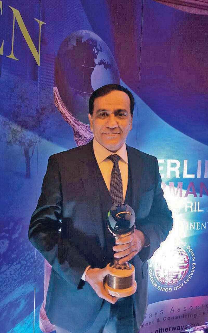 pak oasis ceo mr irshad poses with the european green era award photo pr