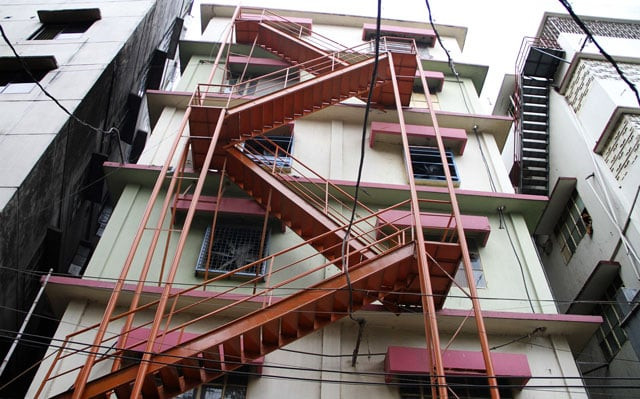 this photograph taken on april 21 2016 shows a view of a fire escape at a bangladesh garment factory in dhaka photo afp this photograph taken on april 21 2016 shows a view of a fire escape at a bangladesh garment factory in dhaka photo afp