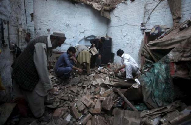 residents search for belongings in the rubbles of a house after it was damaged by an earthquake in peshawar pakistan october 26 2015 photo reuters residents search for belongings in the rubbles of a house after it was damaged by an earthquake in peshawar pakistan october 26 2015 photo reuters