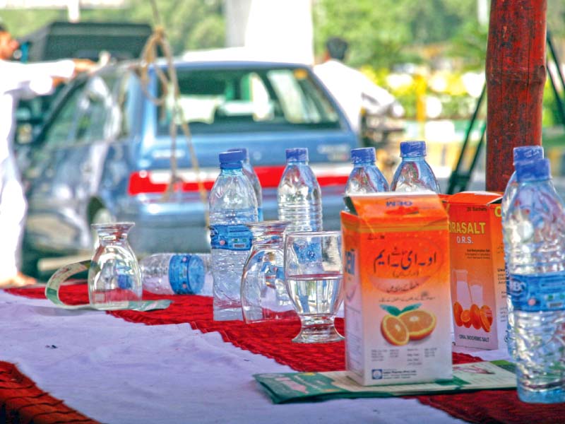 oral rehydration salts and water bottles were offered at the first relief response centre established by the health department and the city administration near nipa on university road on friday photo athar khan express