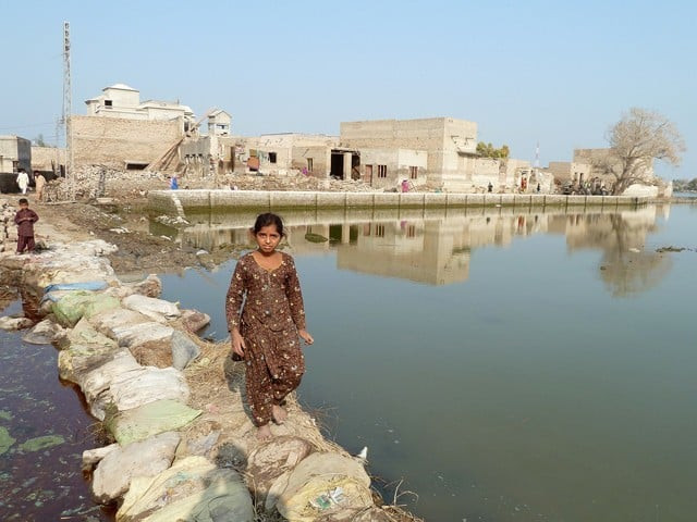 villages flooded after a breach in jamrao canal near preetamabad photo dfid file villages flooded after a breach in jamrao canal near preetamabad photo dfid file