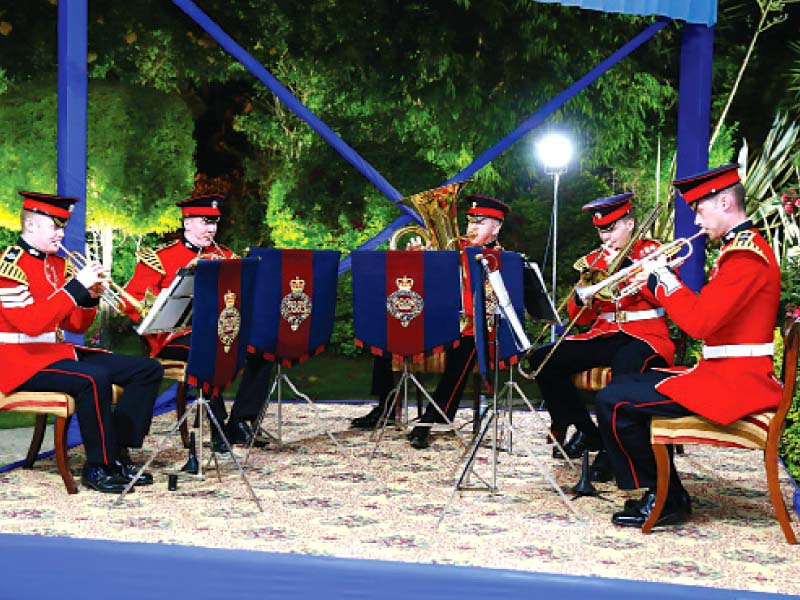 the event featured music from a british military quintet and british cuisine such as the iconic fish and chips wrapped in newspaper photo express