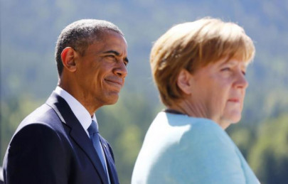 obama embracing ally merkel on farewell trip to germany