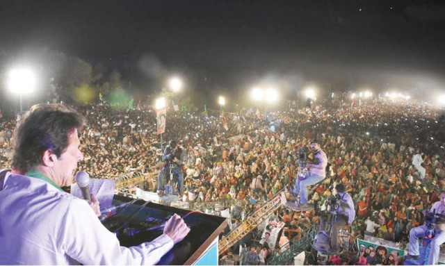pti chairman imran khan addresses party workers and supporters at f 9 park in islamabad photo inp pti chairman imran khan addresses party workers and supporters at f 9 park in islamabad photo inp