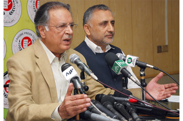 information minister pervaiz rashid speaking to reporters at the lahore press club photo express