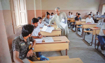 watchful eye exam centres raided to curb cheating in peshawar