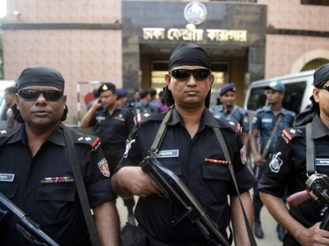 bangladeshi security personnel stand guard outside the main prison in dhaka photo afp