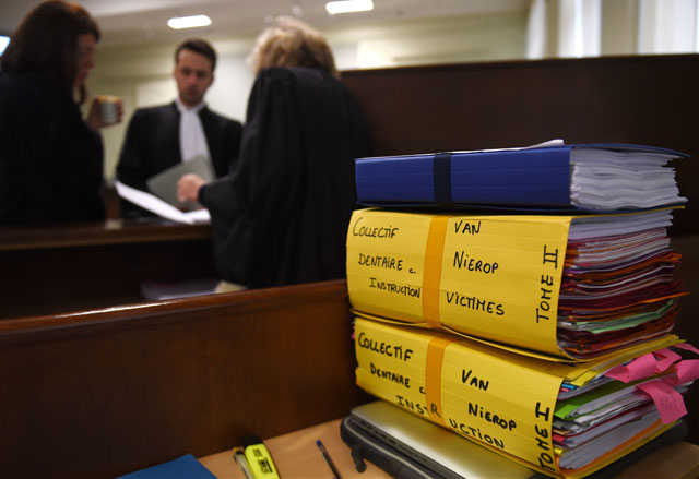 this file photo taken on march 8 2016 shows folders of the trial of dutch jacobus marinus van nierop dubbed as quot the dentist of the horror quot at the nevers courthouse central france photo afp