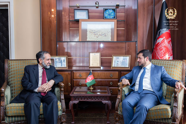 pakistani envoy abrar hussain talking to afghan deputy foreign minister for administrative affairs naseer ahmad andesha in kabul on april 26 2016