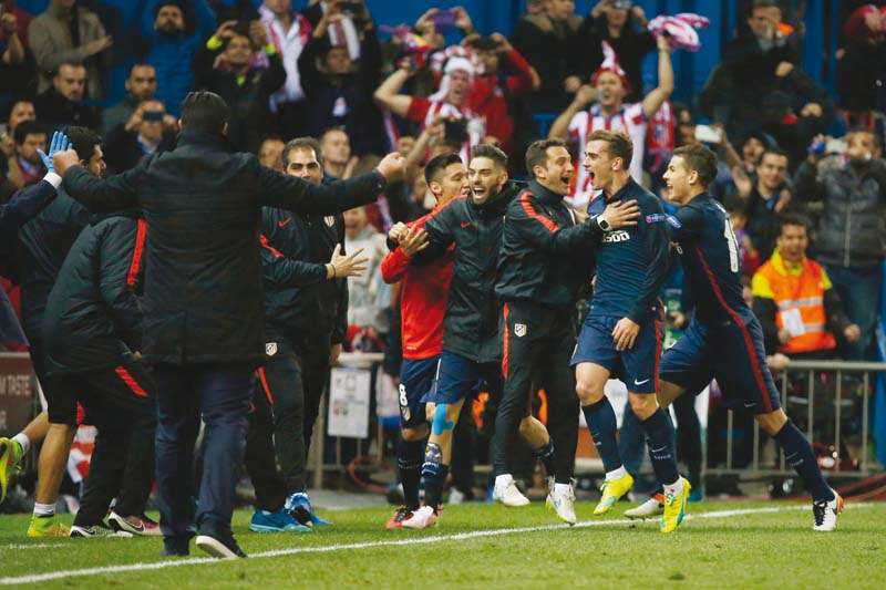 griezmann celebrates after scoring the winner against defending champions barcelona in the quarter final photo reuters