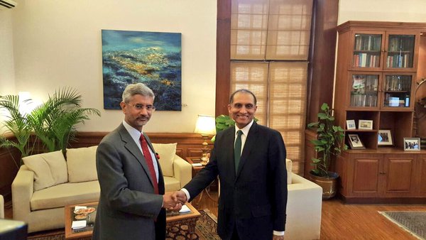 foreign secretary aizaz ahmed chaudhry shakes hands with his indian counterpart subrahmanyam jaishankar on tuesday photo mea india