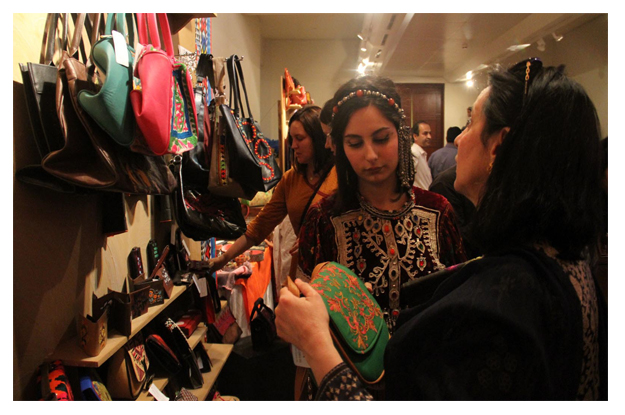 people visiting the stalls during handmade exhibition photo inp