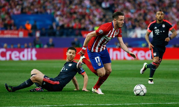 saul niguez skips past the challenge of xabi alonso as he starts his mazy jinky run into the area to score photo reuters