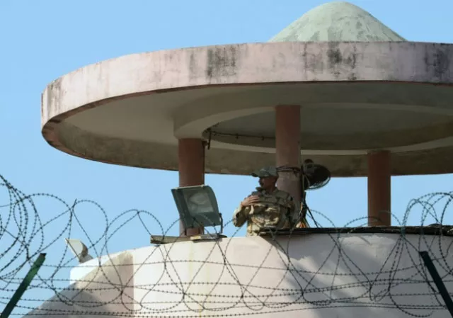 a policeman stands guard at a watchtower at new delhi 039 s high security tihar jail photo afp a policeman stands guard at a watchtower at new delhi 039 s high security tihar jail photo afp