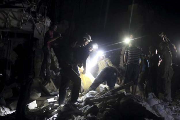 civil defence members search for survivors after an airstrike at a field hospital in the rebel held area of al sukari district of aleppo syria april 27 2016 photo reuters