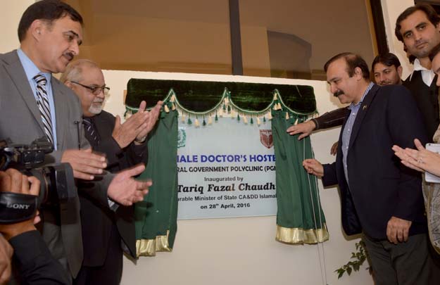 tariq fazal inaugurates three storey hostel for female doctors at polyclinic photo express