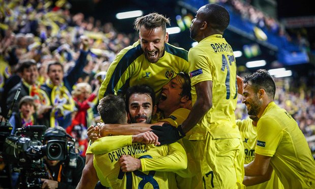 villarreal s players and fans celebrate after adrian lopez scored during injury time photo afp