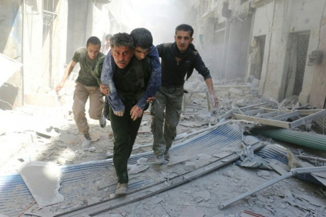 syrians evacuate an injured man following an air strike on a rebel held neighbourhood in the northern syrian city of aleppo on april 29 2016 photo afp syrians evacuate an injured man following an air strike on a rebel held neighbourhood in the northern syrian city of aleppo on april 29 2016 photo afp