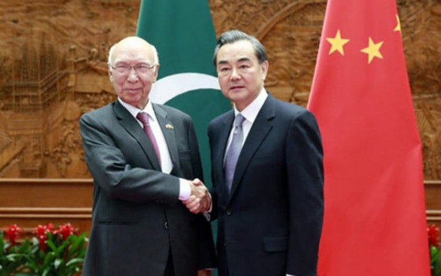 a file photo of a meeting between sartaj aziz and chinese foreign minister wang yi photo file a file photo of a meeting between sartaj aziz and chinese foreign minister wang yi photo file