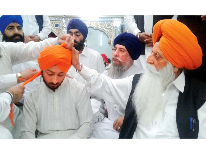 ajay singh s dastar bandi during a condolence reference at gurdwara bhai joga singh photo jehangir shahzad express