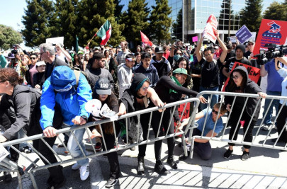 tense protests outside trump speech in california
