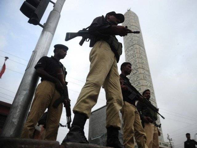 the exchange of fire took place in pirabad area of karachi also injuring a passer by photo reuters file