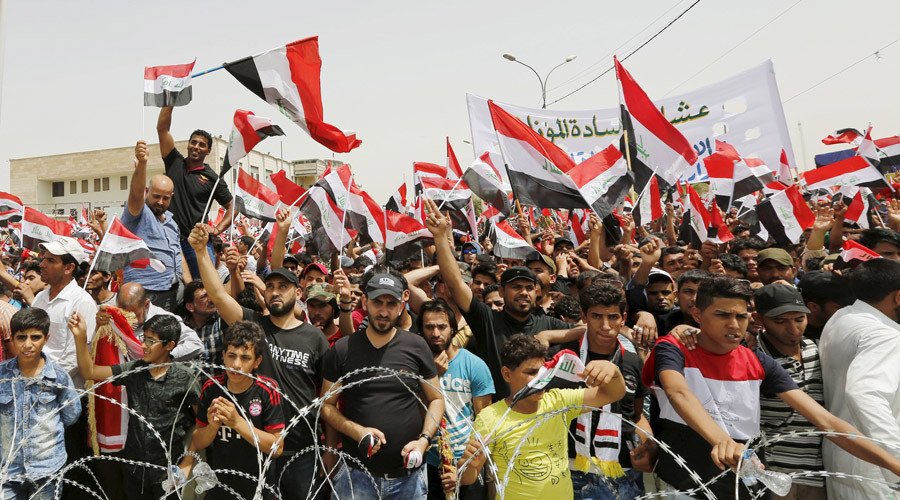 followers of iraq 039 s shiacleric moqtada al sadr in the streets outside baghdad 039 s heavily fortified green zone in iraq april 26 2016 photo reuters