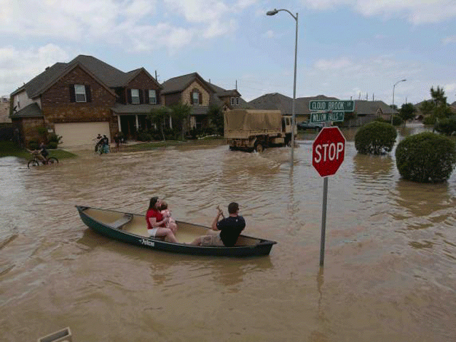 a woman holds a baby in a canoe as texas guardsmen arrive to assist after flooding in brookshire texas u s april 20 2016 u s army national guard 1st lt zachary west handout via photo reuters a woman holds a baby in a canoe as texas guardsmen arrive to assist after flooding in brookshire texas u s april 20 2016 u s army national guard 1st lt zachary west handout via photo reuters