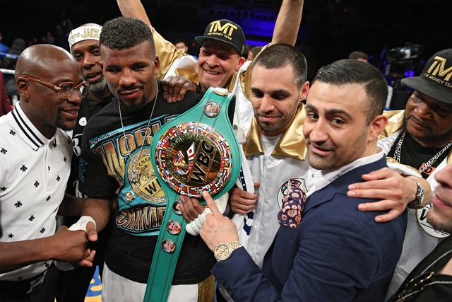 badou jack of sweden talks to floyd mayweather left after a draw against lucian bute in their wbc super middleweight championship bout at the dc armory on april 30 2016 in washington dc photo afp