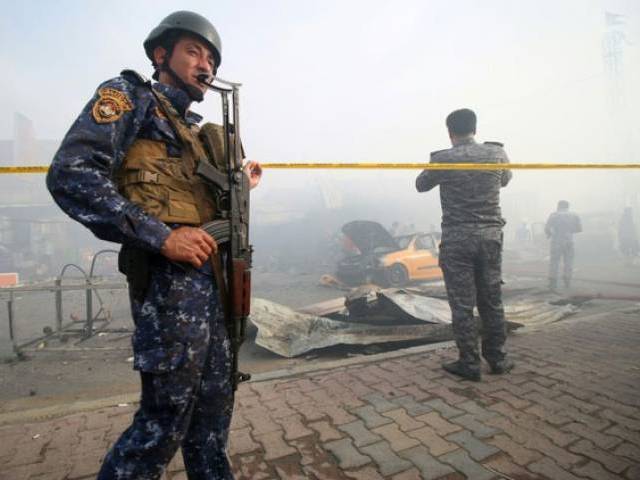 unverified online photographs showed a large plume of smoke rising above the buildings as well as burnt out cars and bodies on the ground at the site of one of the blasts including several children photo afp file