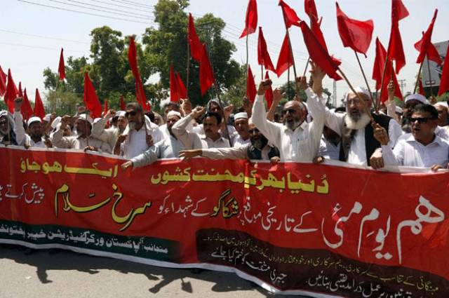 members of pakistan workers confederation are holding a rally to present tribute to martyrs of chicago on the universal labourer day photo ppi members of pakistan workers confederation are holding a rally to present tribute to martyrs of chicago on the universal labourer day photo ppi