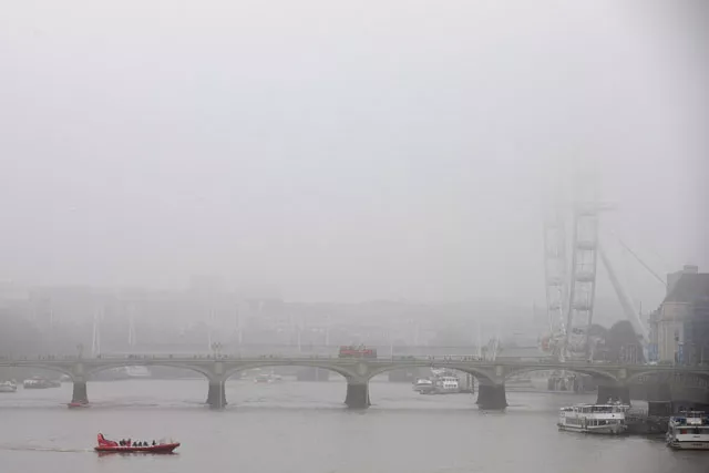 a boat travels along the river thames as fog shrouds the london eye r in central london on november 2 2015 photo afp a boat travels along the river thames as fog shrouds the london eye r in central london on november 2 2015 photo afp