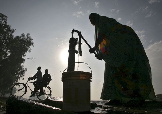 a women uses a hand pump to fill drinking water on the outskirts of amritsar in the northern state of punjab india november 15 2015 photo reuters a women uses a hand pump to fill drinking water on the outskirts of amritsar in the northern state of punjab india november 15 2015 photo reuters