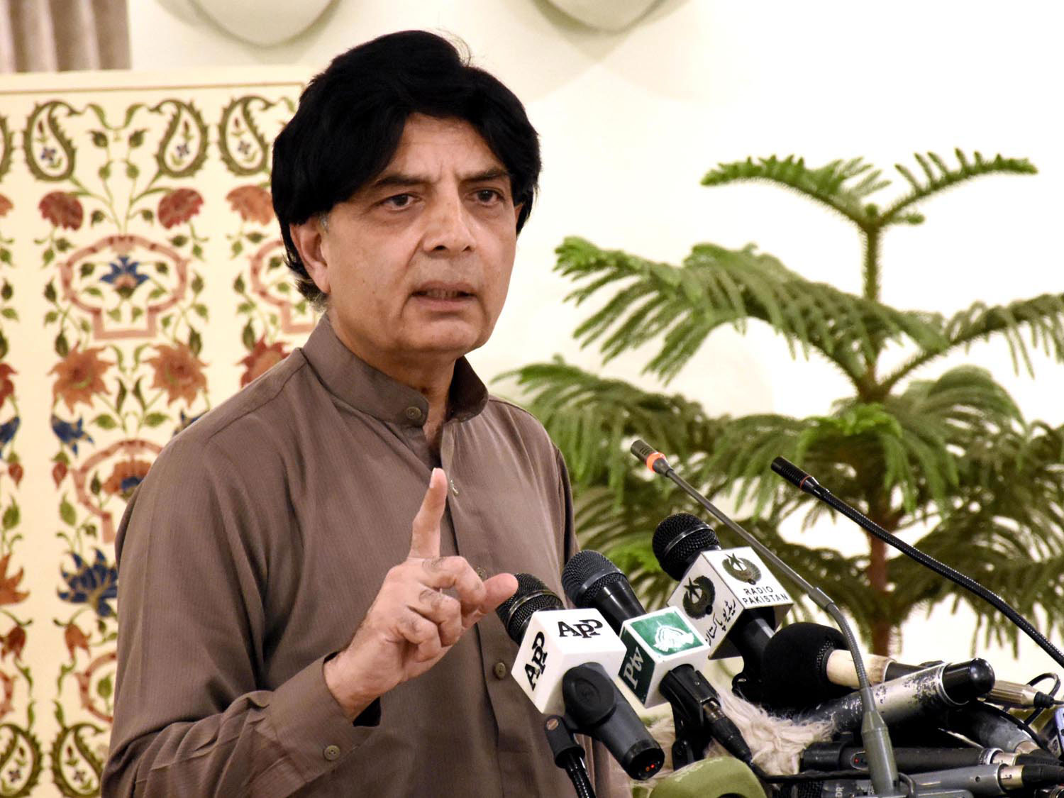 interior minister addressing a press conference in islamabad on april 11 2016 photo pid