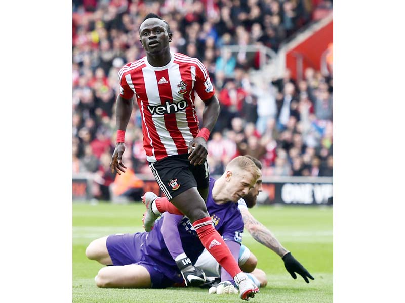 mane scored a superb hat trick to condemn city to a 4 2 defeat that leaves the manchester giants looking nervously over their shoulders as they bid to hold onto fourth spot photo afp