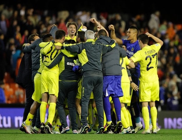 villarreal players celebrate their classification for the next year 039 s uefa champions league at the mestalla stadium in valencia on may 1 2016 photo afp