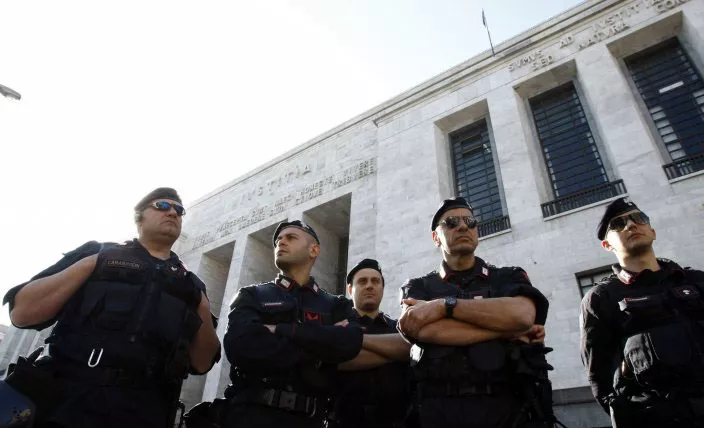 in this file photo italy 039 s carabinieri police officers stand outside milan 039 s court on april 6 2011 photo reuters in this file photo italy 039 s carabinieri police officers stand outside milan 039 s court on april 6 2011 photo reuters