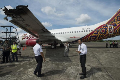 indonesian planes clip wings at airport in latest scare indonesian planes clip wings at airport in latest scare
